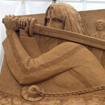 март 2015 Рюген. Германия. Международный фестиваль по скульптуре из песка. 'Килл Билл' - автор Кураев.